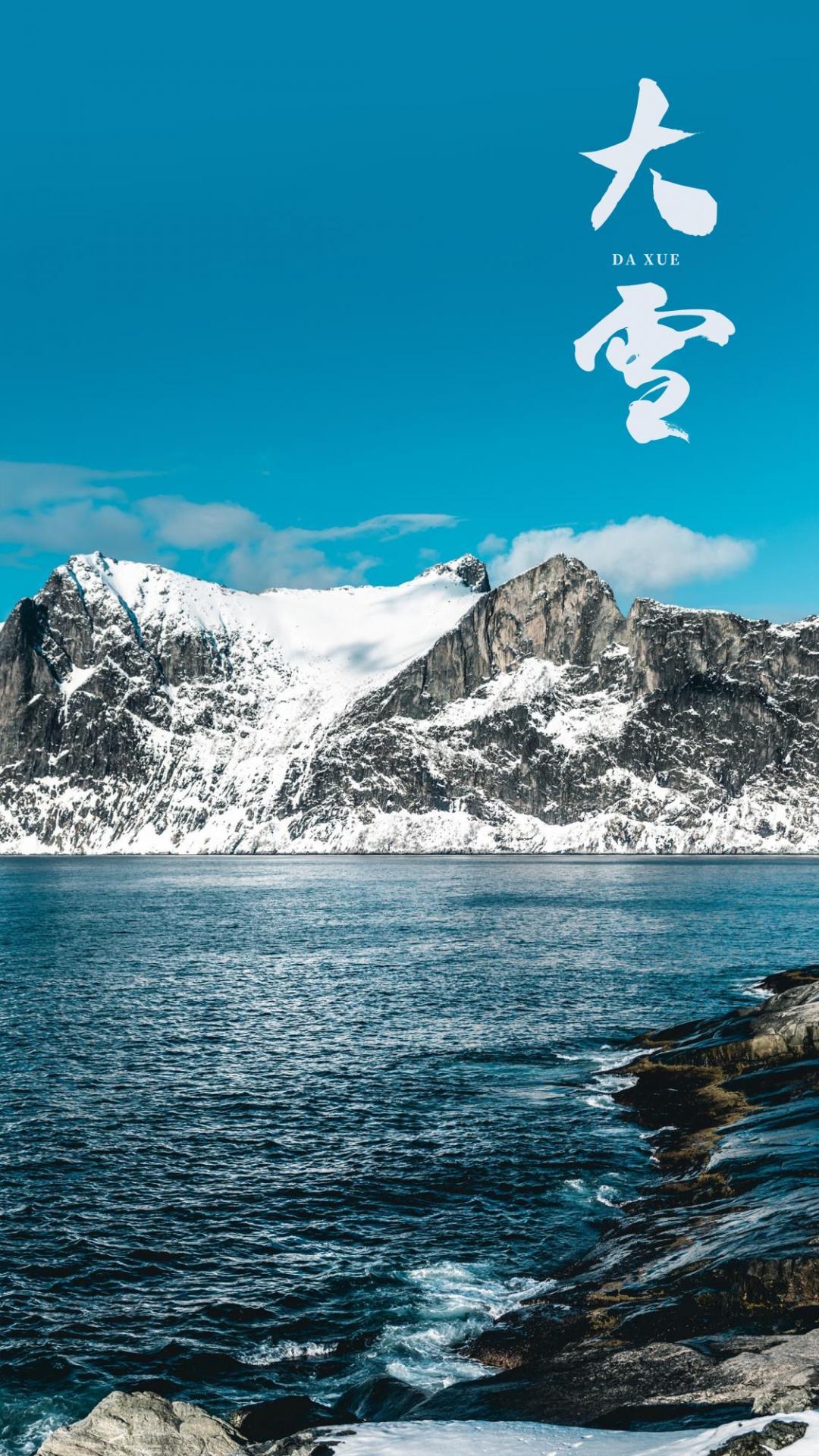 高清大雪时节峻峭山峰景色背景图片