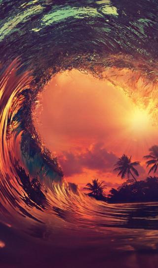 好看的橙黄的夕阳映在卷起的巨浪的唯美场景背景图