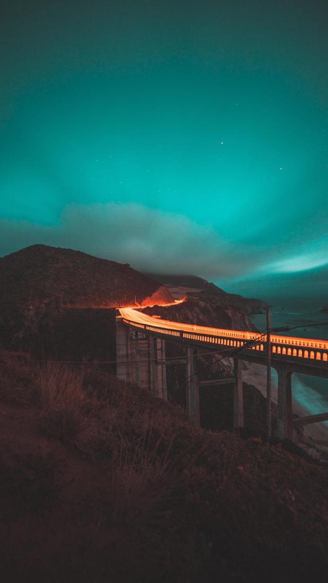 夜晚沿海桥上的灯光手机壁图片