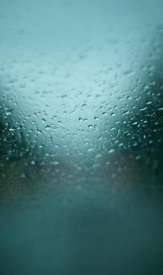 被雨打湿的窗户背景图