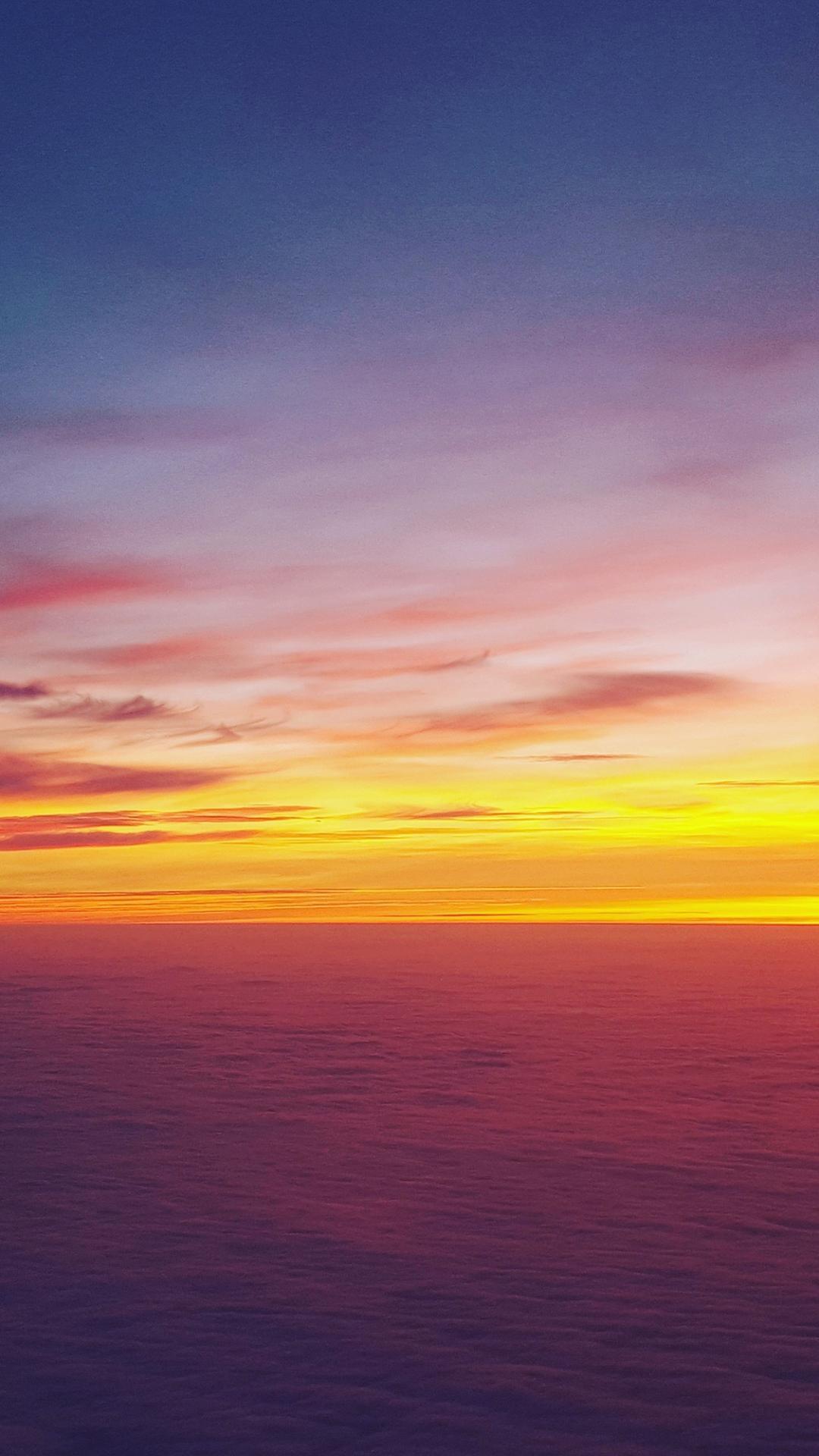 余晖下的夕阳手机壁纸图片