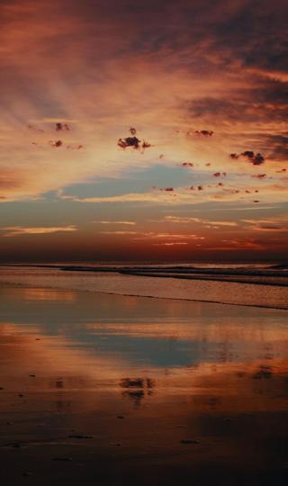 海边晚霞时分的美景图片手机壁纸