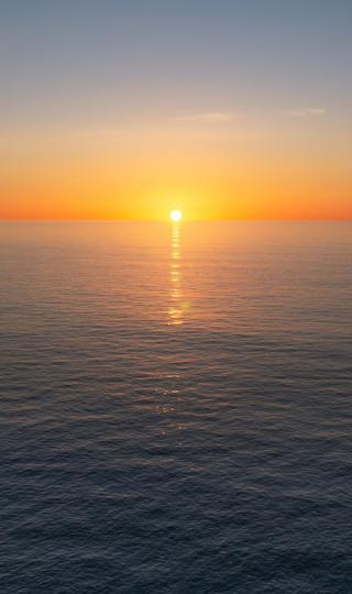 大海海上日落唯美风景手机壁纸